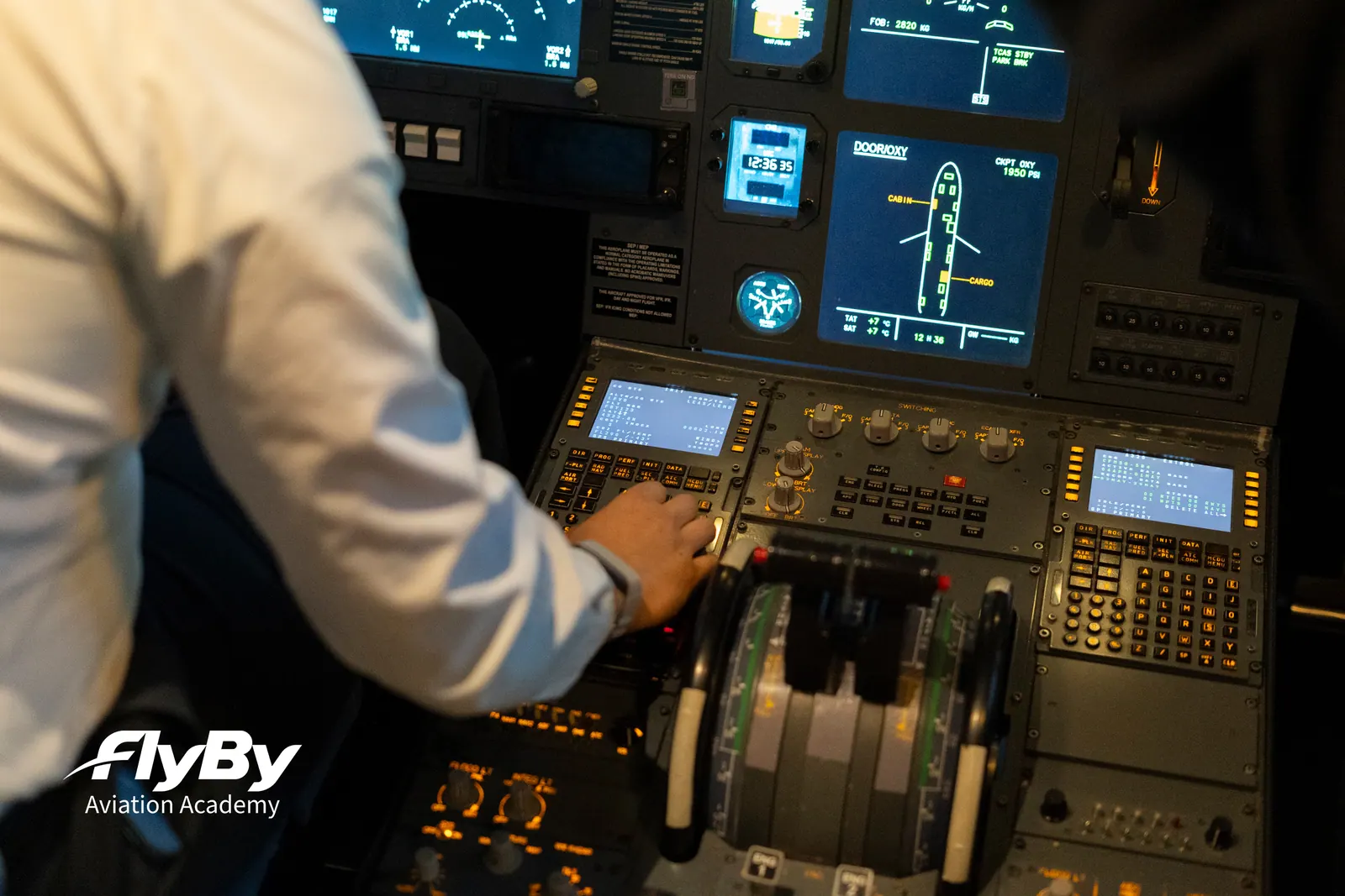 A pilot’s hand on the thrust levers of an airliner
